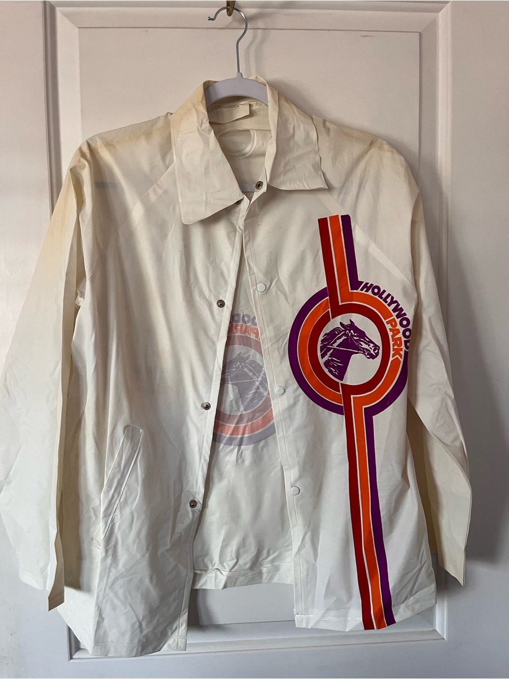 Hollywood Park Cream Coach Raincoat with Retro Stripe Graphic